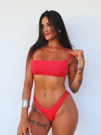 top solar vermelho