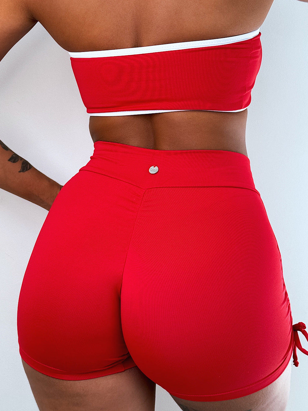 short aura vermelho